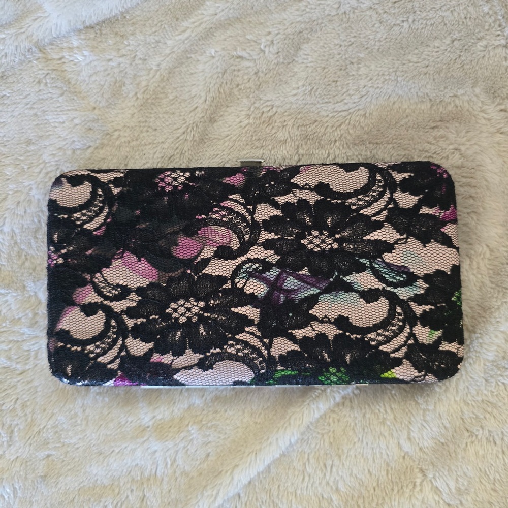 Floral wallet with black lace.